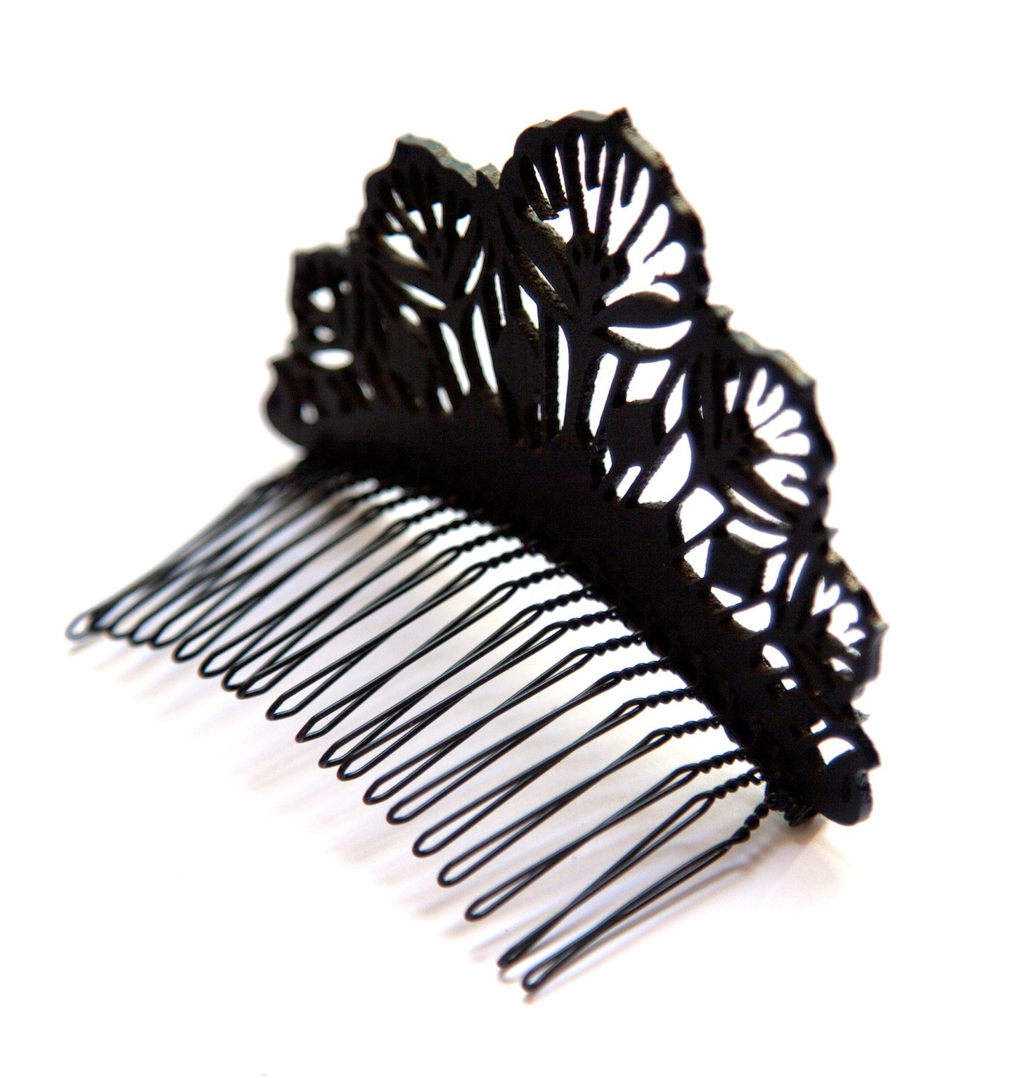 small black laser-cut lace style leather hair comb side view